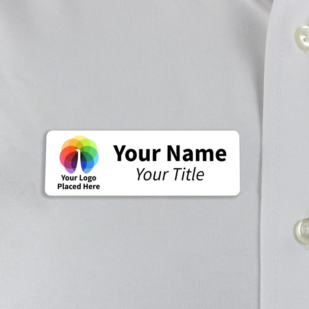 White 1x3  inch name tag - sample template - worn on a off-white dress shirt for size perspective