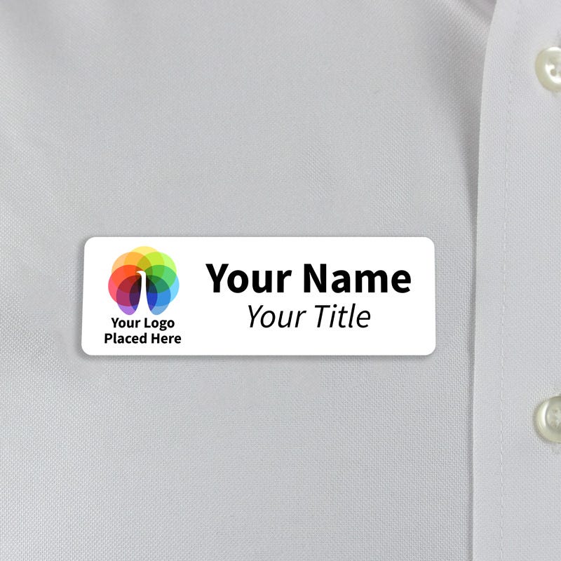 white 1x3 name tag - sample template - worn on a off-white dress shirt for size perspective