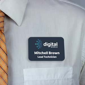 dark blue full-color name tag - lead technician - worn on a light blue dress shirt for size perspective