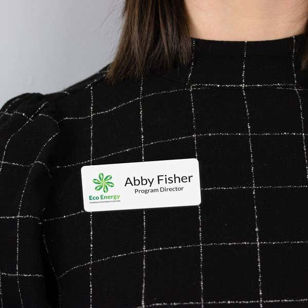 Customized White Name Tag on Black Business Attire 