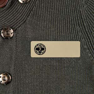 Gold Name tag with black logo 