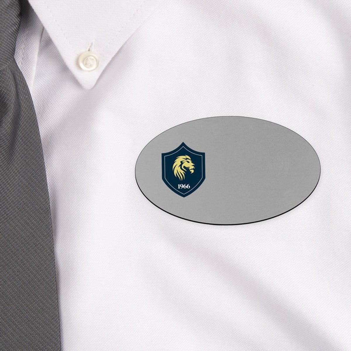 Silver Oval Name Badge on white white shirt 