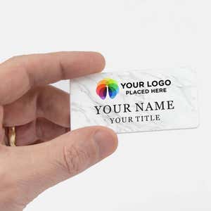 Hand holding Name Badge 