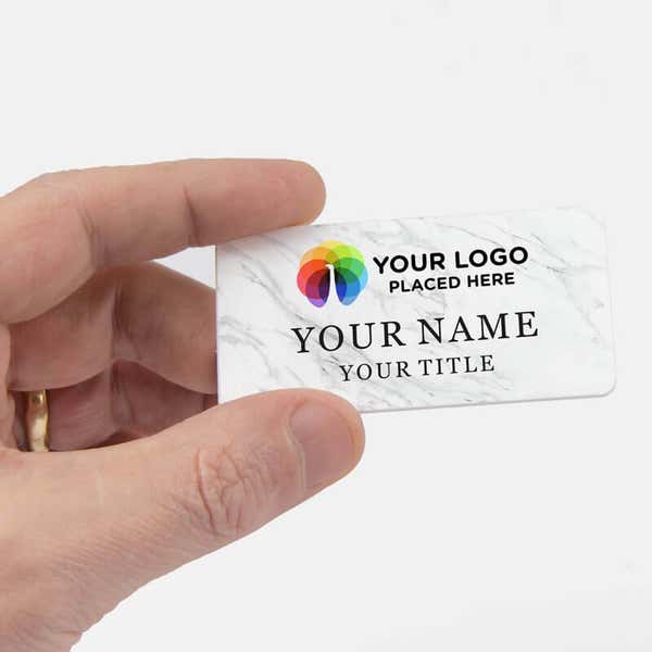 Hand holding Name Badge 