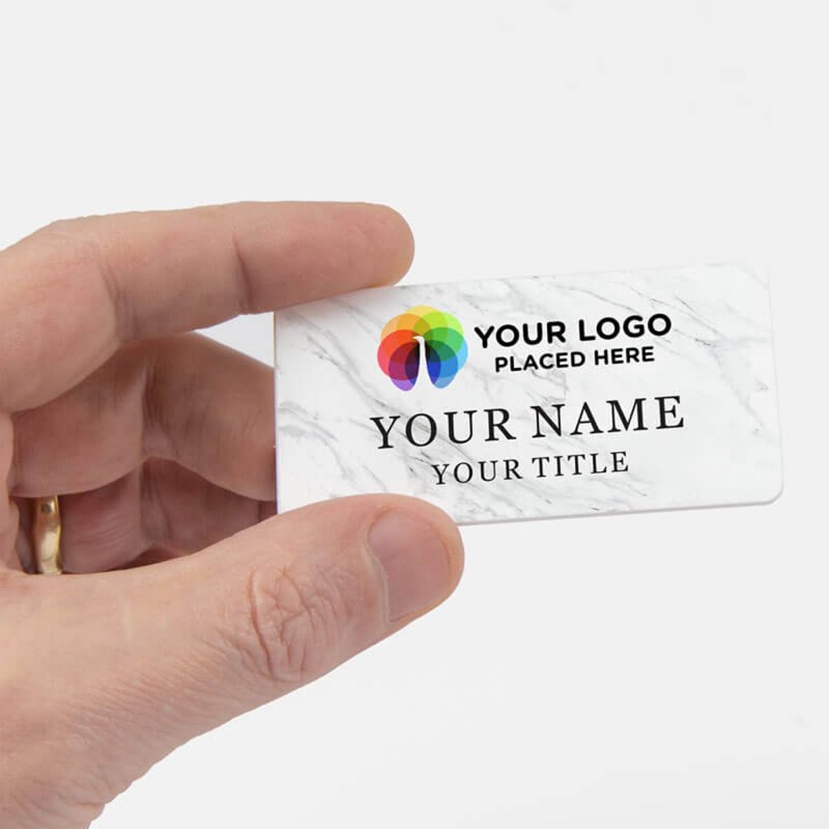 Hand holding Name Badge 