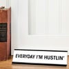 White desk plate with black custom text in black holder
