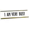 White desk plate with black custom text in yellow gold holder