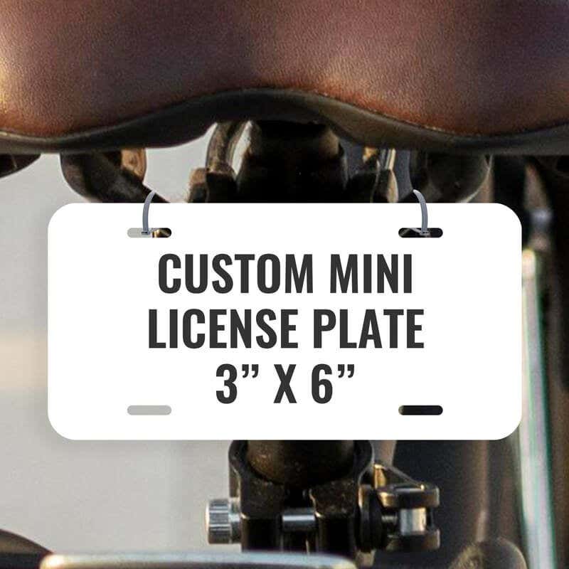 Custom Mini License Plate for Bicycle & Toy Cars 3x6 Shown on a Bicycle