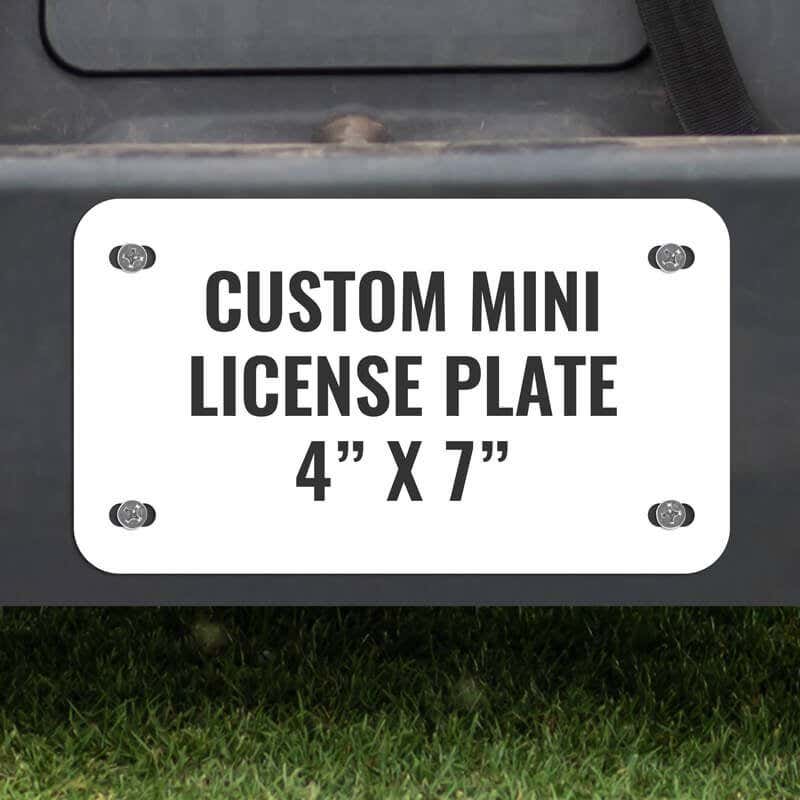 Custom Mini License Plate for Golf Carts 4x7 Shown on a Gold Cart