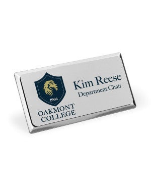 Executive Name Badges with a silver frame and white uv printed logo and name