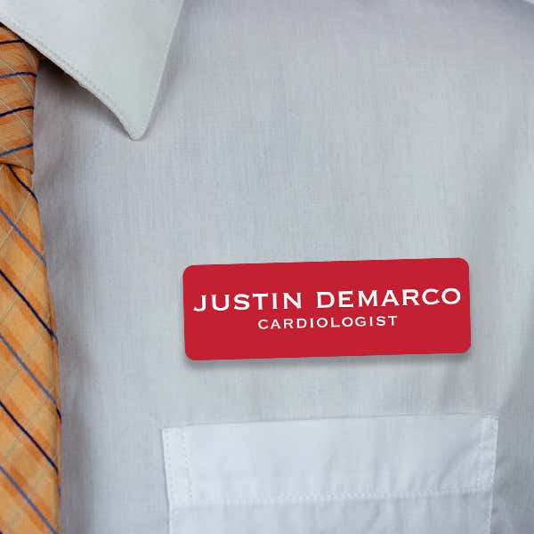 Engraved Plastic Custom Name Tag in Block Serif Font on Shirt with Tie