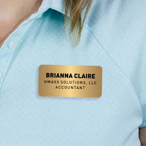 Engraved Plastic Custom Name Tag with 3 Lines of Custom Text on Blue Polo Shirt
