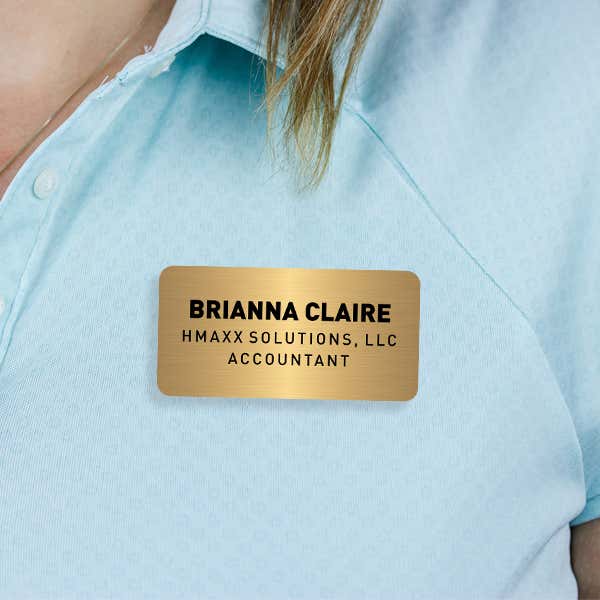 Engraved Plastic Custom Name Tag with 3 Lines of Custom Text on Blue Polo Shirt