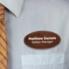 Engraved Plastic Custom Oval Name Tag with Oval Border on White Shirt with Orange Tie