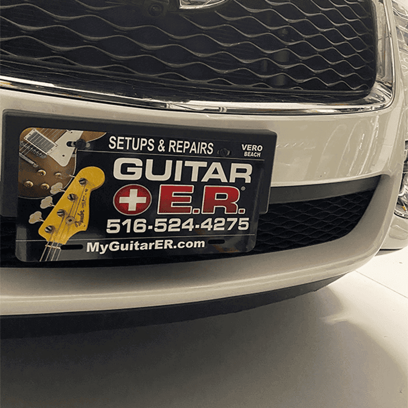 Logo Custom License Plate on Front of Car