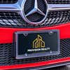 Upload Your Logo Custom Front License Plate on Red Car at an Angle