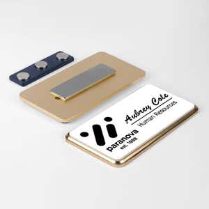 1.5x3 executive engraved name badge with gold beveled frame showing magnetic backing attachment — custom name tag for corporate and HR teams