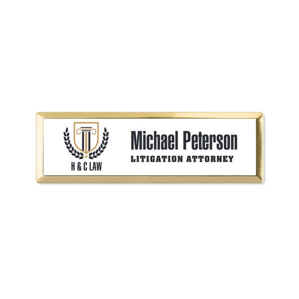 White Uv printed name tag with a gold metal frame