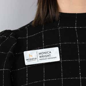 1.25" x 3" UV Printed Full Color Upload Your Logo Name Tag on Soft Cloud Background on Black Blouse