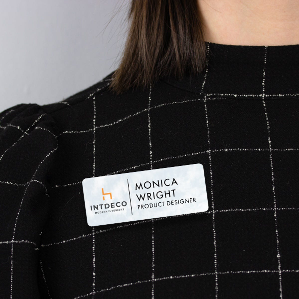 1.25" x 3" UV Printed Full Color Upload Your Logo Name Tag on Soft Cloud Background on Black Blouse