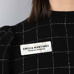 1" x 3" UV Printed Full Color Name Tag on Elegant Marble Background with Bold Custom Text on Black Blouse