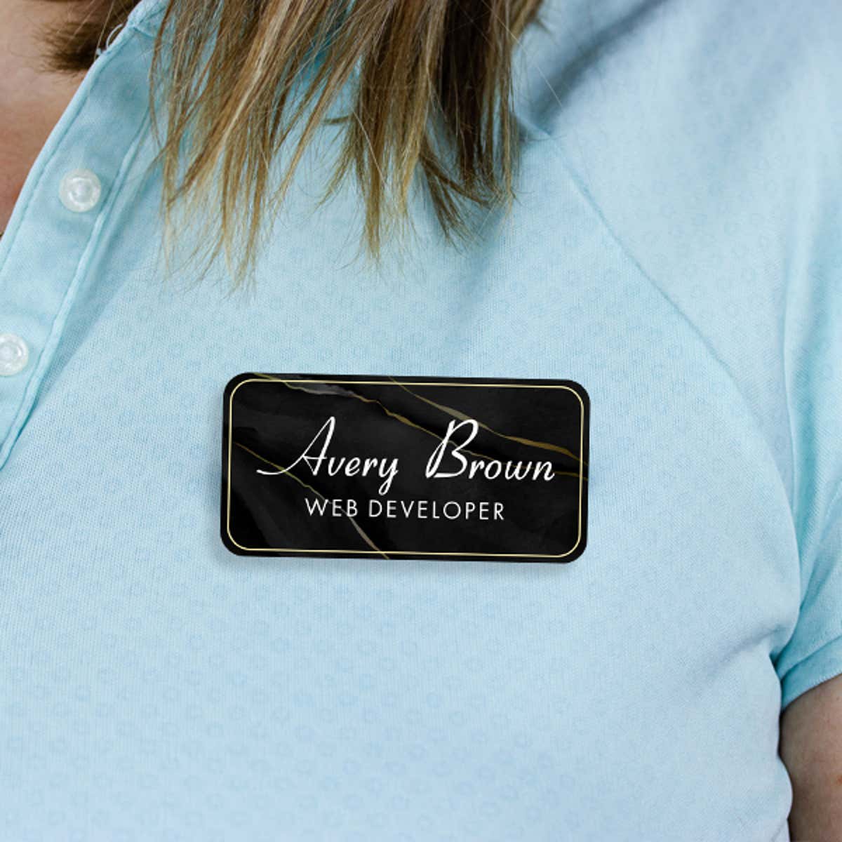 1.5" x 3" UV Printed Full Color Name Tag on Black and Marble Background on Blue Polo Shirt