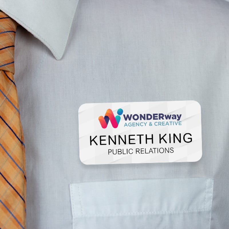 1.5" x 3" UV Printed Full Color Upload Your Logo Hello My Name Is Name Tag on Modern Background with Gold Detail on White Shirt with Tie