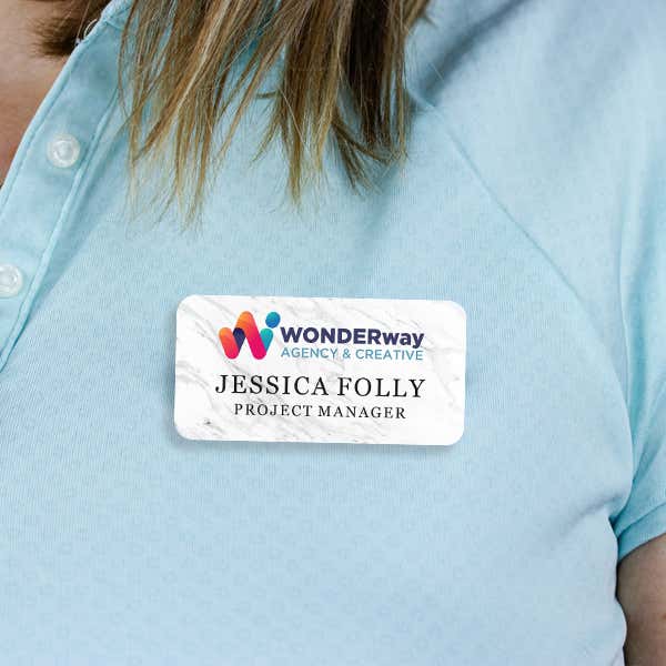 1.5" x 3" UV Printed Full Color Upload Your Logo Name Tag on Marble Background on Blue Polo Shirt